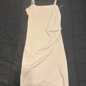 large white ruched dress with a slit